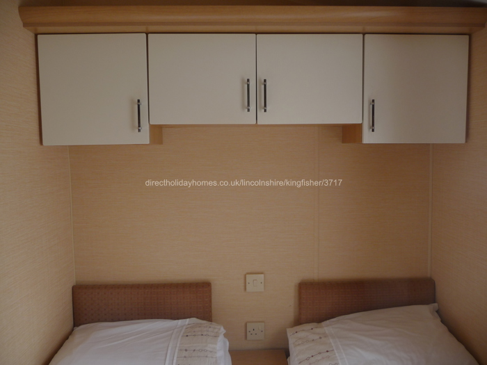 Twin bedroom with plenty of storage