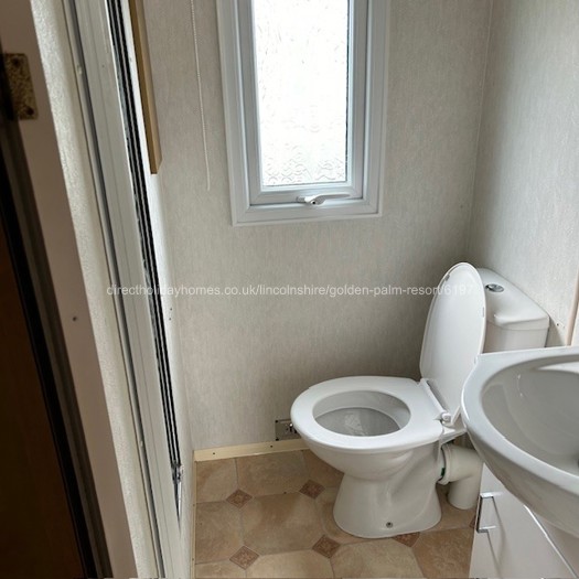Bathroom with shower, WC and basin