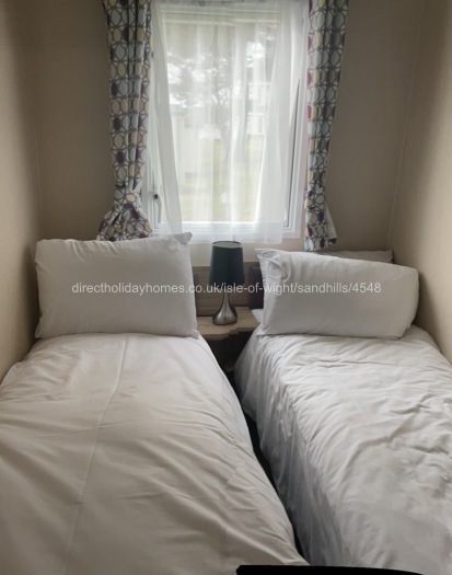 2nd bedroom  Two single beds.