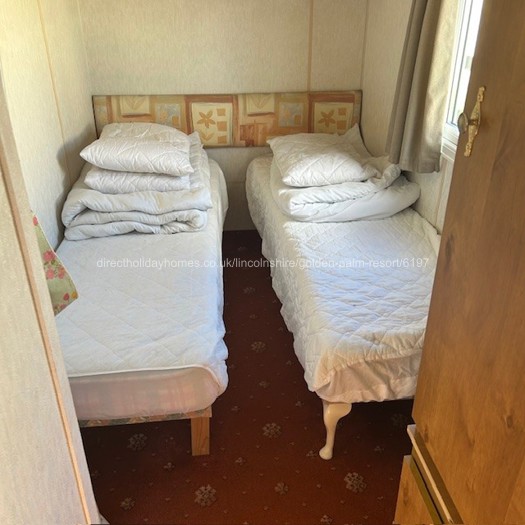 One of two twin bedrooms