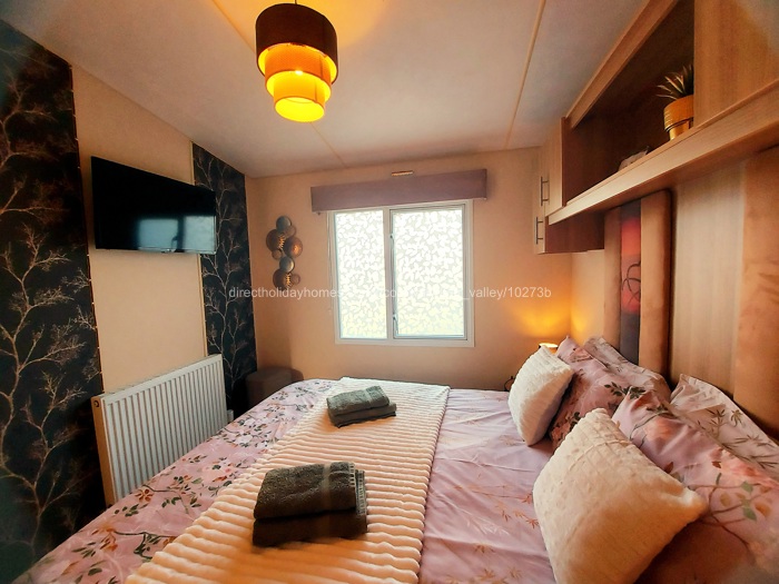 32" LED TV in master bedroom