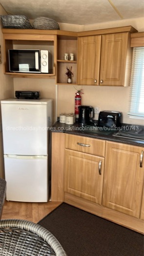 Kitchen with fridgefreezer