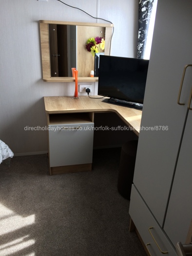 42” 4K tv in master bedroom 