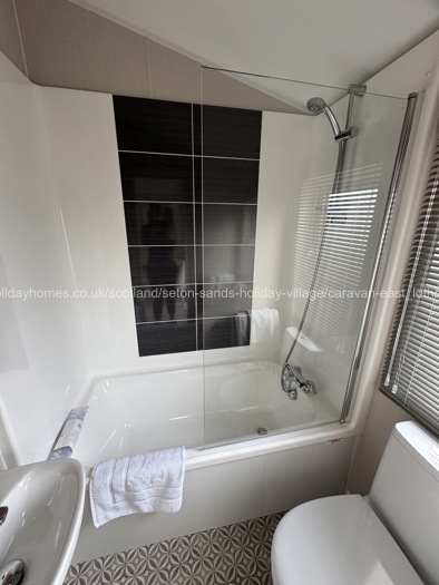 Ensuite with shower over bath. 