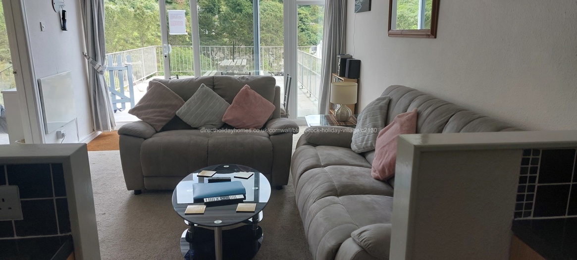 Lounge area with large patio window