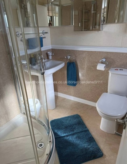 Large shower,his her cabinets.