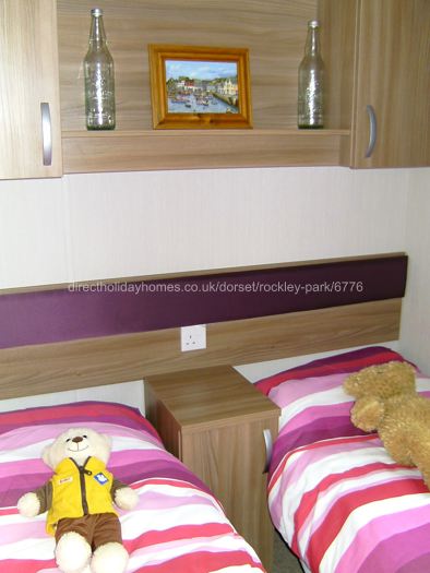 one of 2 twin beds
