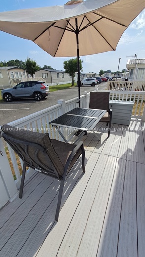 Sun deck at front with umbrella 