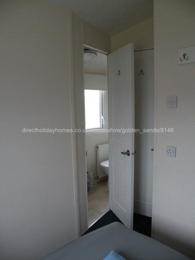 on suite bathroom n the double bed 