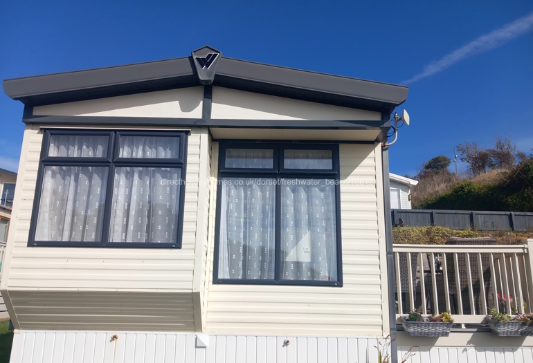 Elevated position. Top windows open
